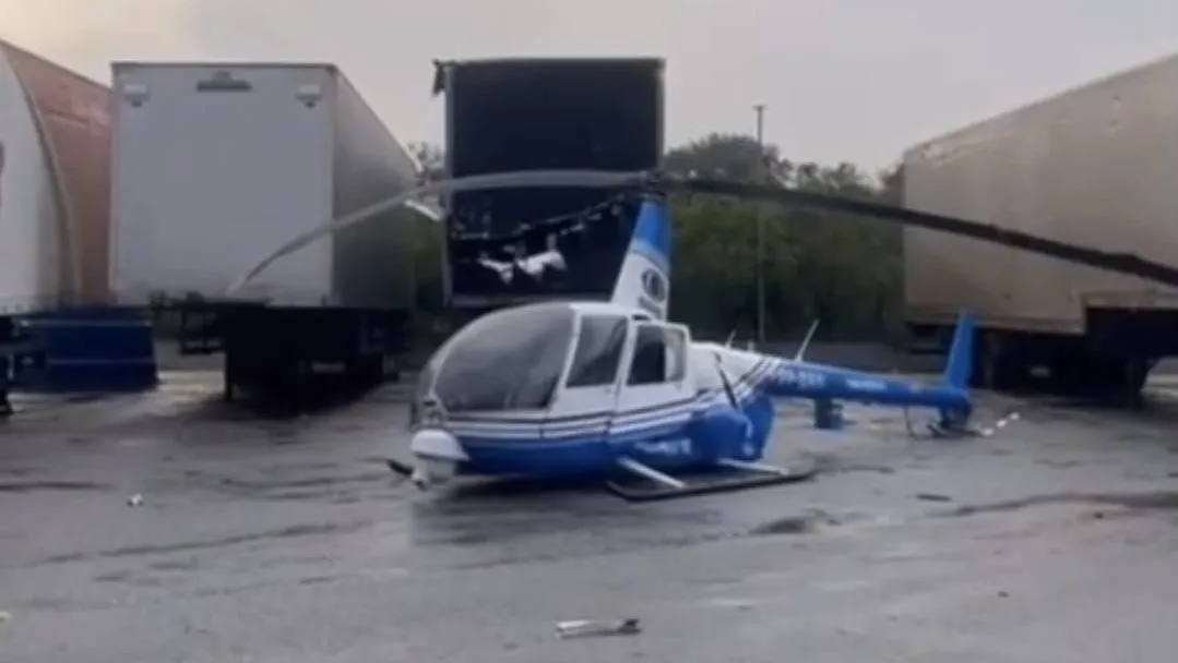 Helicóptero da Band cai na Dutra, na altura de Guarulhos